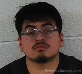 Mugshot of KEVIN YAHIR BUSTOS booked in Surry County, North Carolina on April 10, 2026