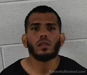 Mugshot of ELVIS XAVIER SANTIAGO-RIVERA booked in Surry County, North Carolina on April 24, 2026