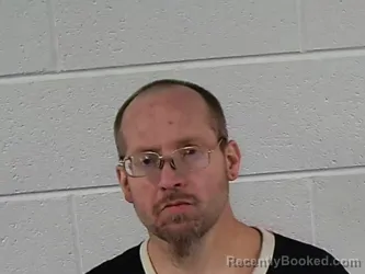 Mugshot of CHARLES DAVID COOK booked in Surry County, North Carolina on May 17, 2026