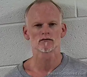 Mugshot of KEITH THOMAS HOLLAND booked in Surry County, North Carolina on July 13, 2026