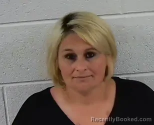 Mugshot of HEATHER DANIELLE OWEN ATKINS booked in Surry County, North Carolina on July 24, 2026