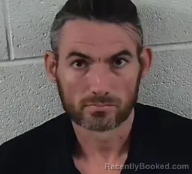 Mugshot of Joshua Phillip Lewis booked in Surry County, North Carolina on August 24, 2026