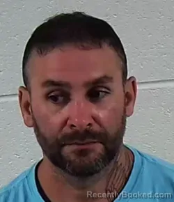 Mugshot of Joshua Todd Cheek booked in Surry County, North Carolina on August 25, 2026