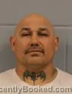 Mugshot of Tony Augustine Flores booked in Winona County, Minnesota on October 23, 2026