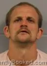 Mugshot of Matthew Steven Tlougan booked in Winona County, Minnesota on August 12, 2026