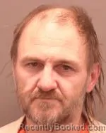 Mugshot of John Raymond Vandeneykel