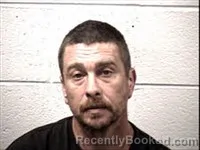 Mugshot of Travis Wayne Nettles booked in Transylvania County, North Carolina on August 18, 2026