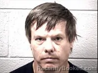 Mugshot of Thomas Emery Brutscher booked in Transylvania County, North Carolina on August 22, 2026
