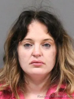 Mugshot of COURTNEY DANIELLE PENNINGTON booked in DeSoto County, Mississippi on May 10, 2026