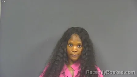 Mugshot of MONIQUA NASHAY TOLIVER booked in DeSoto County, Mississippi on April 26, 2026