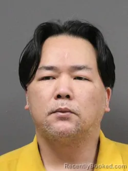 Mugshot of Quan Zheng booked in DeSoto County, Mississippi on August 22, 2026