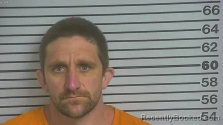 Mugshot of MICHAEL JOESEPH HOOLAHAN booked in Forrest County, Mississippi on March 22, 2026