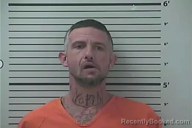 Mugshot of JOSHUA ERVIN BAUDEAN