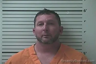 Mugshot of JUSTIN BRENNAN FAYARD