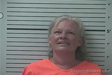 Mugshot of JENNIFER LYNN ANDERSON booked in Hancock County, Mississippi on April 28, 2026