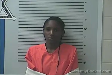 Mugshot of LIZ MOLLY SAMBA booked in Hancock County, Mississippi on April 29, 2026