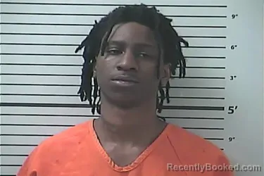 Mugshot of MARKELLE TRAVELLE EVANS booked in Hancock County, Mississippi on April 30, 2026