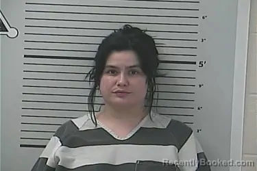 Mugshot of ASHLEY MARIE UZZELL booked in Hancock County, Mississippi on June 2, 2026