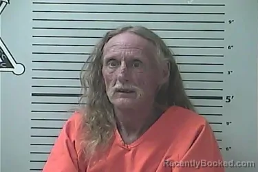 Mugshot of CHARLES WARREN CUTSIGNER booked in Hancock County, Mississippi on July 3, 2026