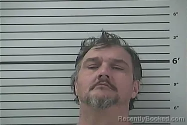 Mugshot of MILTON CHEBAR SIMS booked in Hancock County, Mississippi on July 27, 2026