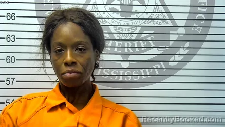 Mugshot of ALICIA RENEE DUCKSWORTH booked in Harrison County, Mississippi on April 25, 2026