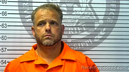 Mugshot of MATTHEW JAMES SWAN booked in Harrison County, Mississippi on April 27, 2026
