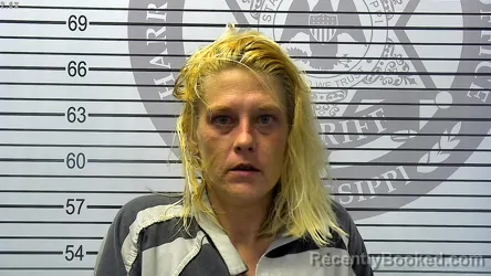 Mugshot of DANIALLE RENEE SERVIS booked in Harrison County, Mississippi on April 27, 2026