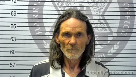 Mugshot of JOHN WAYNE JOHNSON booked in Harrison County, Mississippi on April 28, 2026