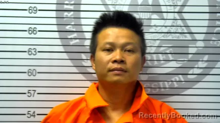 Mugshot of KIEU QUOC TRAN booked in Harrison County, Mississippi on May 1, 2026