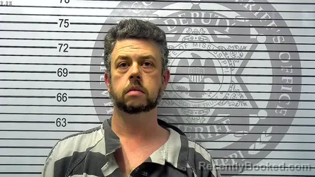 Mugshot of JUSTIN ANDREW CUEVAS booked in Harrison County, Mississippi on May 2, 2026
