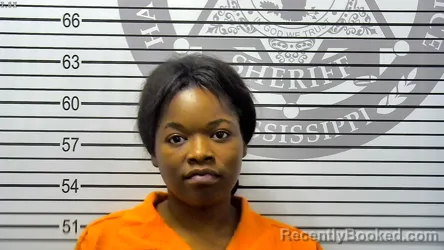 Mugshot of SHANIA ZAKORI SIMONE OWENS booked in Harrison County, Mississippi on May 6, 2026