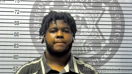 Mugshot of DESHAWN MARQUES REED booked in Harrison County, Mississippi on May 7, 2026