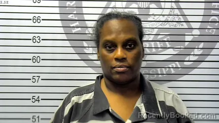 Mugshot of ART KEONNA RAY WANDA HENDERSON booked in Harrison County, Mississippi on May 8, 2026