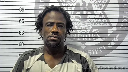 Mugshot of DERRICK LAMAR BARNES booked in Harrison County, Mississippi on May 9, 2026