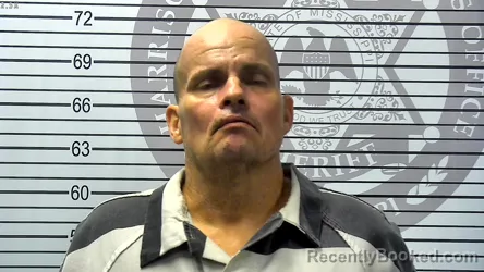 Mugshot of JOSHUA MICHAEL JOHNSON booked in Harrison County, Mississippi on May 9, 2026