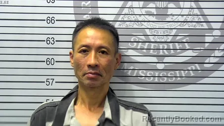 Mugshot of TUAN THANN NGUYEN booked in Harrison County, Mississippi on May 10, 2026