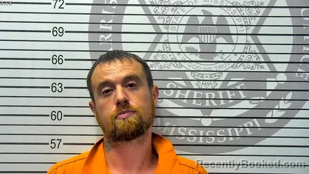 Booking photo from Harrison County, Mississippi