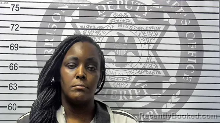 Mugshot of DIANE DENISE LEWIS booked in Harrison County, Mississippi on May 12, 2026