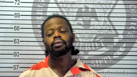 Mugshot of ERIC DEMOND HOUSE booked in Harrison County, Mississippi on May 14, 2026