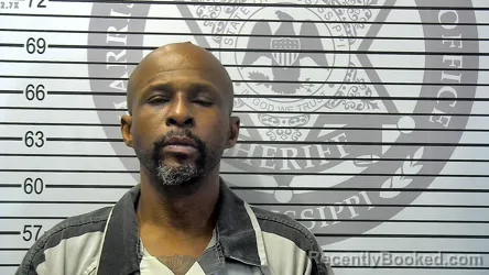 Mugshot of KENNETH WAYNE JOHNSON booked in Harrison County, Mississippi on May 14, 2026