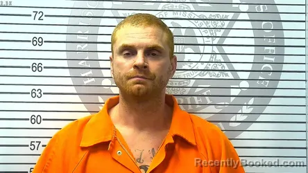 Mugshot of TRAVIS SCOTT WEAKLEY booked in Harrison County, Mississippi on June 14, 2026