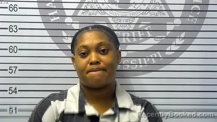Mugshot of DAPRONICA OCTAVIA LASHAY LENOIR booked in Harrison County, Mississippi on July 14, 2026