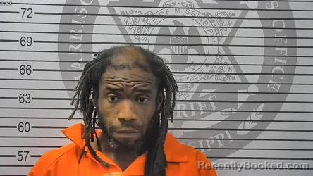Mugshot of Jesse Reshard Sutton booked in Harrison County, Mississippi on August 12, 2026