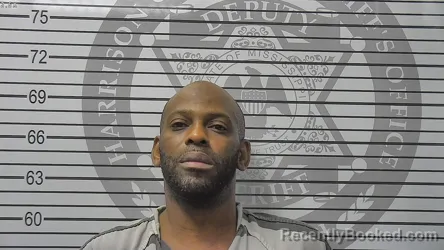 Mugshot of Johnny Clifton Jr Dean booked in Harrison County, Mississippi on August 14, 2026