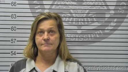 Mugshot of Stacey Darlene Houska booked in Harrison County, Mississippi on August 14, 2026