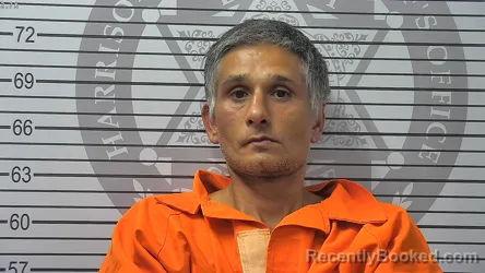 Mugshot of John Edward Dennis booked in Harrison County, Mississippi on August 16, 2026