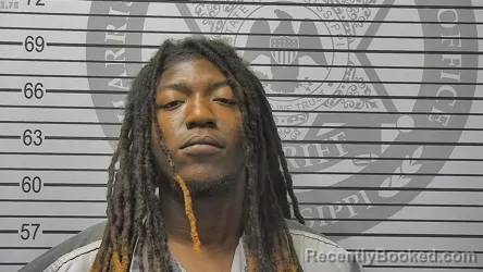 Mugshot of Quintarsus Kentrell Dennis booked in Harrison County, Mississippi on August 16, 2026