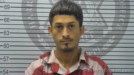 Mugshot of Bryan Evelio Flores-Ortiz booked in Harrison County, Mississippi on August 17, 2026