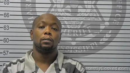 Mugshot of Bruce Darniel Mcinnis booked in Harrison County, Mississippi on August 17, 2026