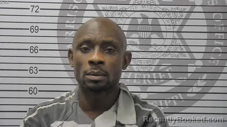 Mugshot of Marco Shanta Evans booked in Harrison County, Mississippi on August 23, 2026